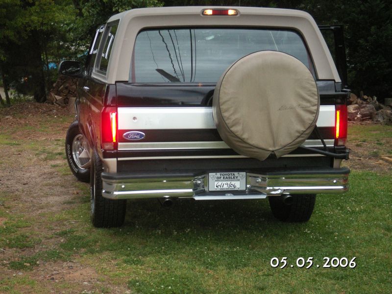 1996 Ford Bronco rear view with spare tire and chrome bumper