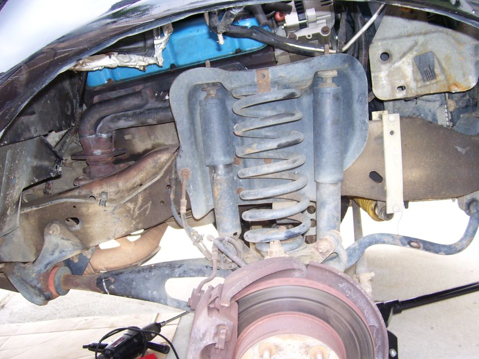 Ripped the splash gaurd down to get to passangerside cylinder head to install header