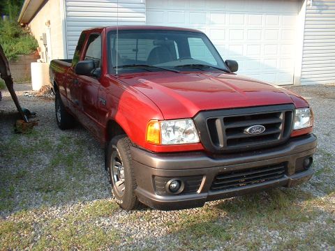 1999 Ford Ranger - This 1999 Ford Ranger pickup truck is parked outside a residential garage.