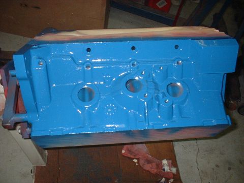 1967 Ford Fairlane - A freshly painted blue engine block sits on a surface, ready for reassembly.