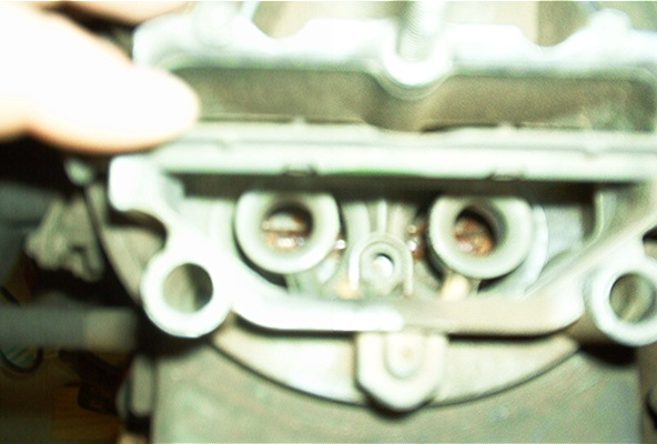 Close-up of a carburetor's intake ports
