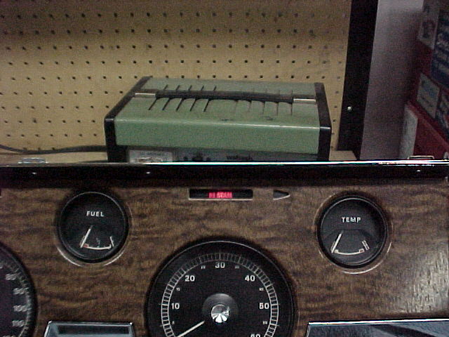 Testing all the bulbs before installation of the dash. You can see the NOS temp guage. Not seen is the NOS Amp guage to the left.