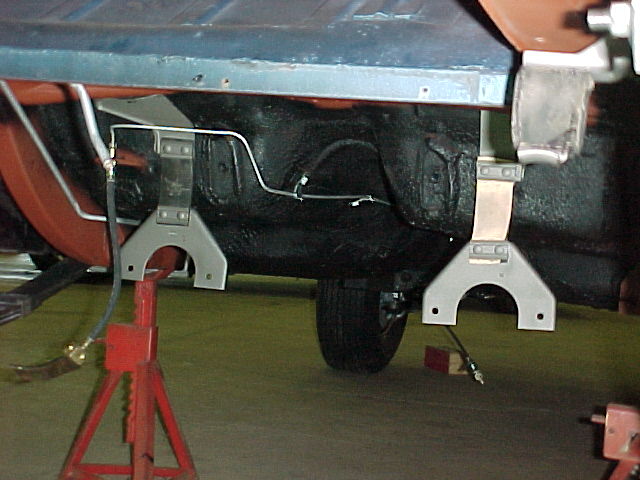The original exhaust hangers restored nicely. Note how the R/H side has white rubber for easy identification by the assembly line installer.