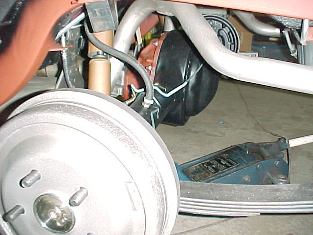 Original Fomoco correctly dated brake drums. NOS Autolite Super Heavy Duty shocks in their distinctive copper color (Note: the assembly line shocks would have been black). The rear axle housing was sandblasted and painted with DP90. A new Detroit Locker was installed along with all new bearings and new Moser axle shafts. New Motorcraft brake linings and new AMK reproduction parking brake cables.