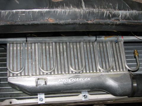 2001 Mercury Grand Marquis - Close-up view of a ProCharger intercooler, likely an aftermarket upgrade.