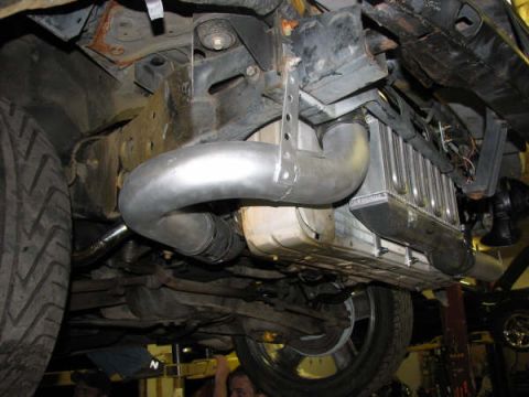 2001 Mercury Grand Marquis - Custom piping and intercooler installed on a vehicle, viewed from below.