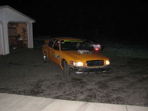 2001 Mercury Grand Marquis - This modified 2001 Mercury Grand Marquis, resembling a taxi, features a prominent hood scoop.