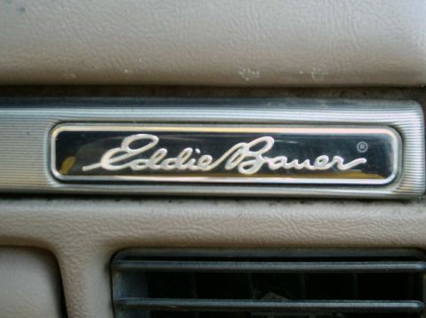 1992 Ford Bronco - Close-up of the Eddie Bauer trim badge on the dashboard of a 1992 Ford Bronco.