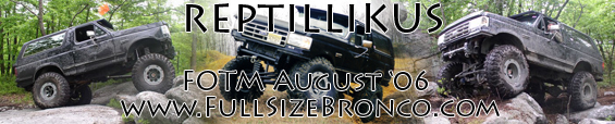 Three black Ford Broncos navigating rocky terrain. 1996 Ford Bronco