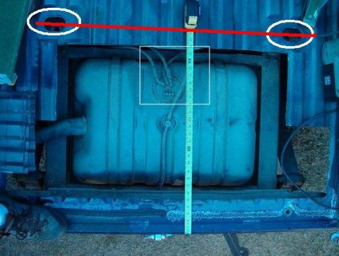 1991 Ford Bronco - Measurement of the fuel tank area, with red lines and circles highlighting specific points.