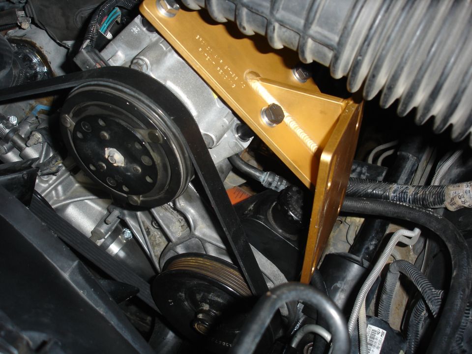 Bronco air bracket installed. I used 1/2" spacers on the top bolts and 1" spacers on the bottom bolts to allow enough clearance to remove the power steering pump cap.