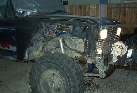 1986 Ford Bronco - This Bronco appears to be undergoing modifications, with its front end disassembled and engine exposed.