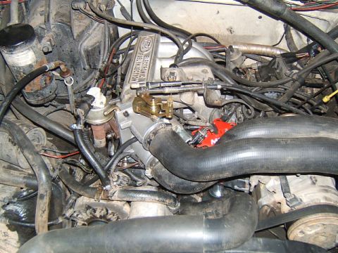 1988 Ford Bronco - Ford engine bay detail, focusing on the electronic fuel injection system components.