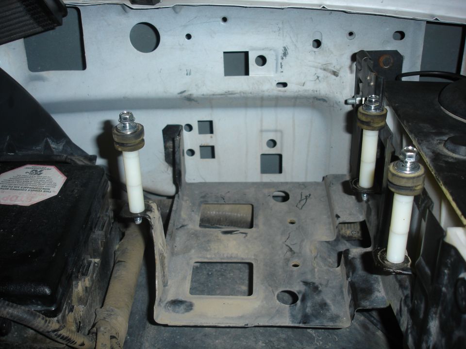 Here's where thing get interesting. Since I spaced the OBA bracket to allow the powersteering pump cap to be removed. This in turn moved the pump up quite a bit. I wanted to retain the stock air box. So I had to space the box up to clear the compressor. I ended up spacing it up 2 1/4".