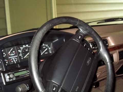 1996 Ford Bronco - Interior view of a Ford Bronco, showing the dashboard and steering wheel.