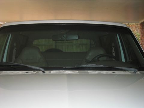 1996 Ford Bronco - View of the interior of a 1996 Ford Bronco, showing the front seats and dashboard.