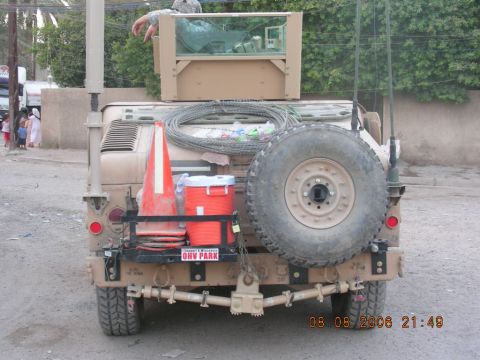 1977 Ford F-150 - Military truck equipped with a spare tire, traffic cone, and cooler is parked outdoors. A date stamp shows 08.08.2008.