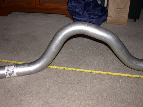 1995 Ford Bronco - Exhaust pipe part shown with a tape measure for size reference. Part number M30001 is visible.