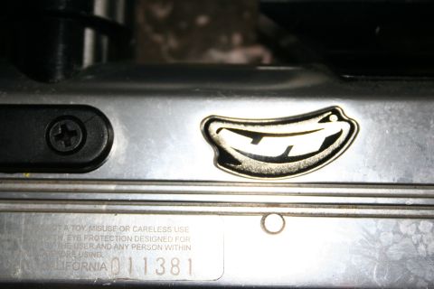 2004 Jeep TJ - This part features a warning about misuse and eye protection, along with a serial number.