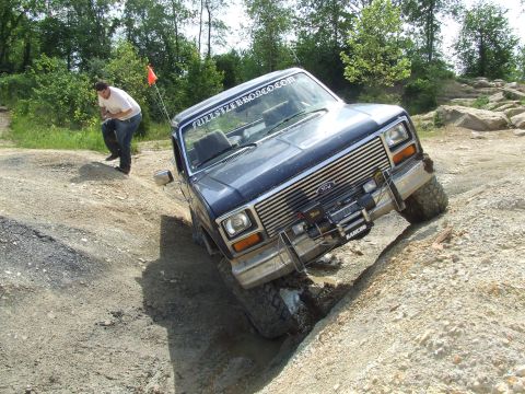 1986 Ford Bronco - This Ford Bronco is tackling a challenging off-road course.