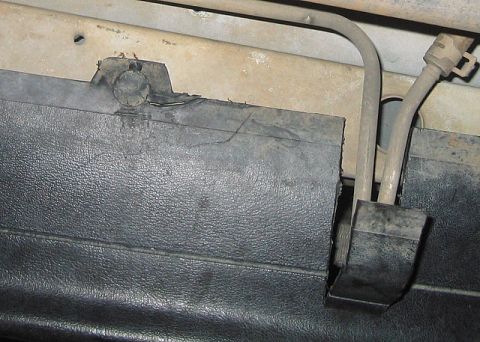 1996 Ford Bronco - Close-up view of automotive trim and hoses, with a SuperMotors watermark visible.