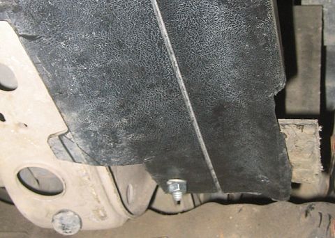 1996 Ford Bronco - used nuts and bolts to hold it in on the sides, and a stock snap from the old radiator matt in the middle