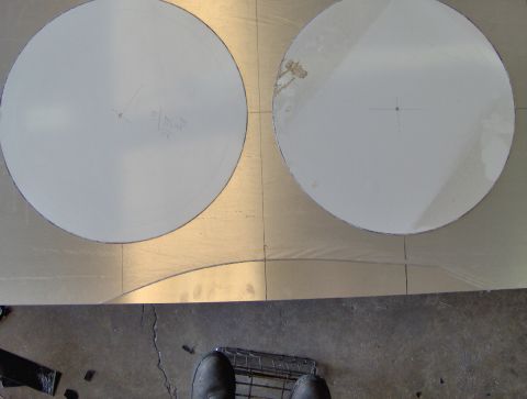 1978 Ford Bronco - Two circles are drawn on a metal surface, one with measurement lines and text.