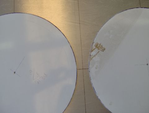1978 Ford Bronco - Two circular metal discs are shown, one with handwritten measurements and markings.