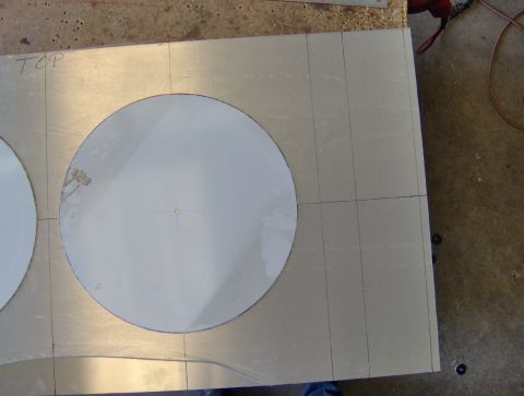 1978 Ford Bronco - A metal sheet is prepared with circular cutouts and marked with grid lines, possibly for a custom project.