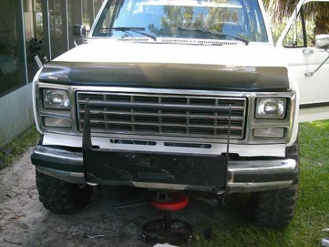1986 Ford Bronco - Front view of a 1986 Ford Bronco, showing its grille and headlights.