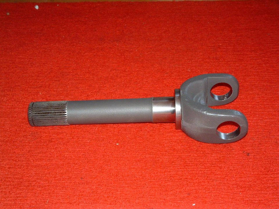 Driveshaft yoke with splined end and U-joint mounting ears