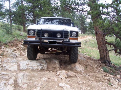1978 Ford Bronco - This 1978 Ford Bronco navigates a challenging rocky trail, its off-road capabilities.