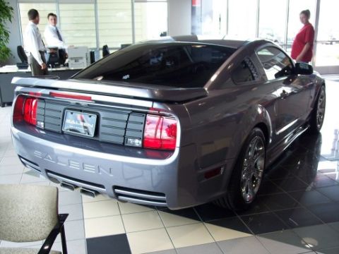 1972 Ford Ranchero - Grey Saleen Mustang parked indoors with Saleen badging visible on the rear.