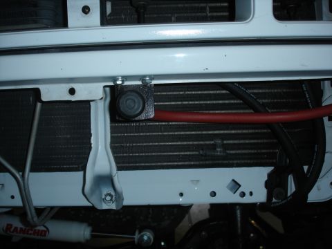 1996 Ford Bronco - I ran only on outlet to the front of the truck temporarily. It's mounted to a bracket and tucked up nice and high. Eventually I will instal…