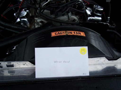 Engine bay with "CAUTION-FAN" sticker and a note that says "Worst Hand"