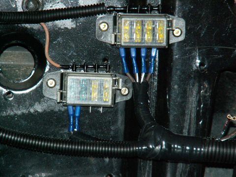 1983 Ford Bronco - here are the two 4-way fuse holders needed for my 6 circuits/relays I am running extra....note the nice tidy wiring now hidden in the tubin…