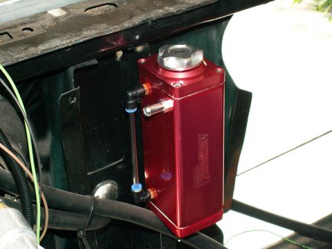 1983 Ford Bronco - closer look at flash overflow tank....need to drill and tap bottom fitting for an inlet from radiator so will suck back coolant and use top…