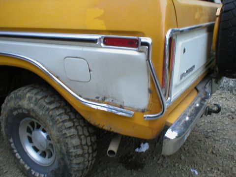 1978 Ford Bronco - Rear view of a 1978 Ford Bronco showing the quarter panel and spare tire mount.