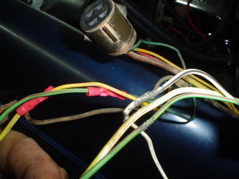 1984 Ford Bronco - This image shows a close-up view of a vehicle's electrical wiring, multiple colored wires and connectors.