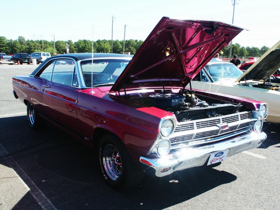 Maroon 1966 Ford Fairlane 500 coupe, front 3/4 view, hood open