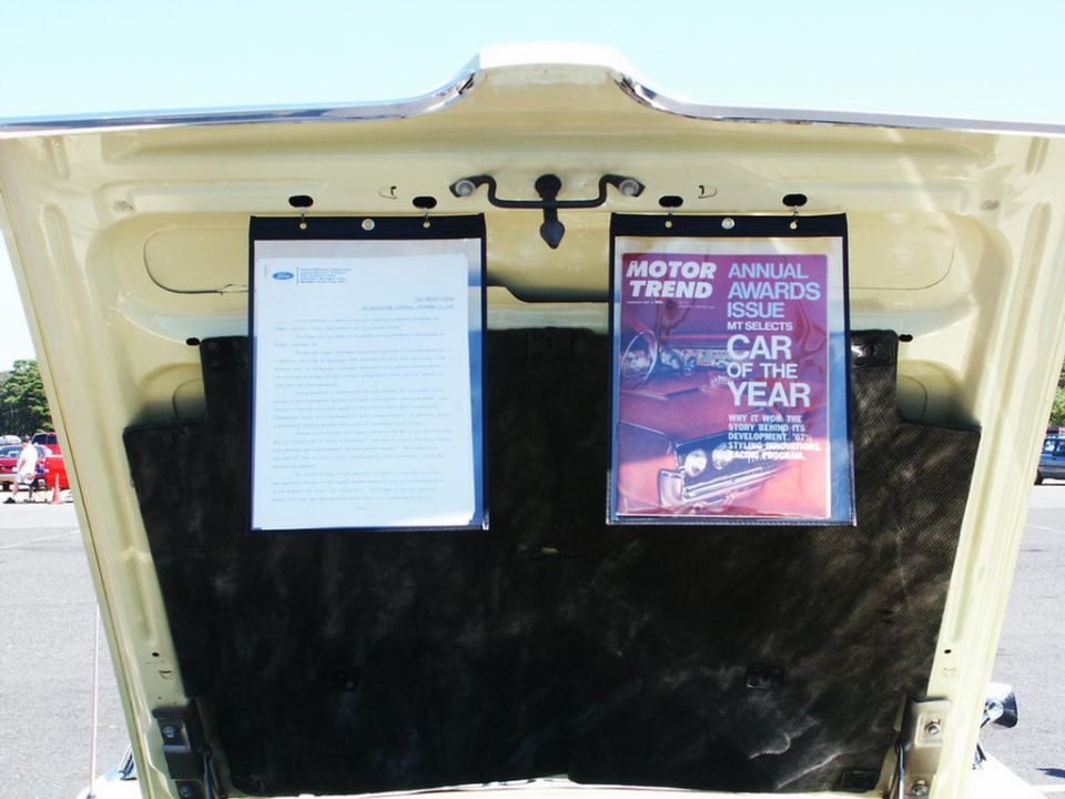 Motor Trend Car of the Year magazine cover displayed on a trunk lid