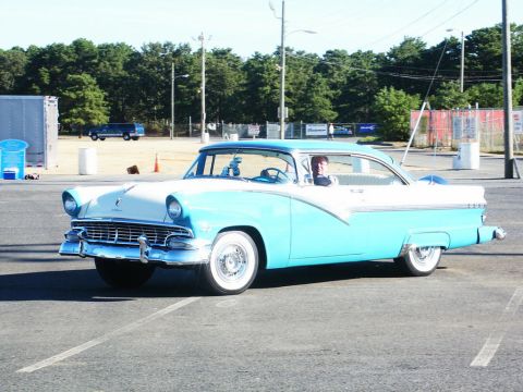 2001 Mercury Grand Marquis - A driver is visible inside this classic two-tone blue and white 1956 Ford Fairlane Crown Victoria coupe.