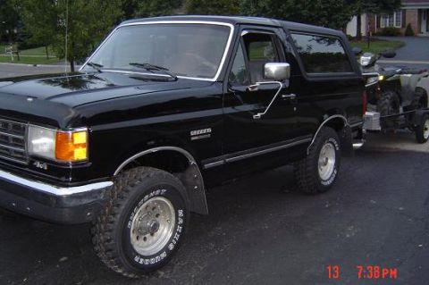 1991 Ford Bronco - Bronco done with Polaris Sportsman on the back.