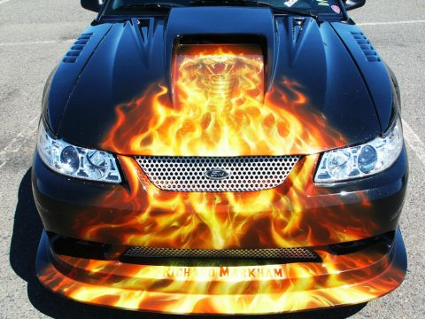 2001 Mercury Grand Marquis - Custom airbrushed Ford Mustang features flames and a cobra graphic on the hood.