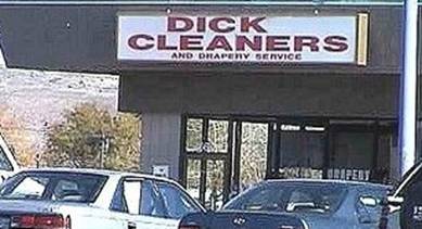 1968 Ford Mustang - Two cars are parked in front of a business with a sign that reads "DICK CLEANERS AND DRAPERY SERVICE."