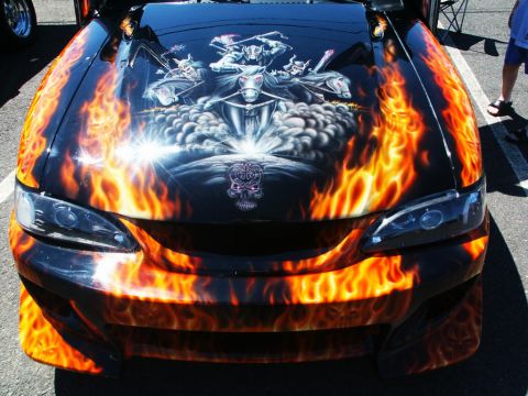 2001 Mercury Grand Marquis - Custom airbrushed car hood features flames and a skull graphic with riders on horseback.