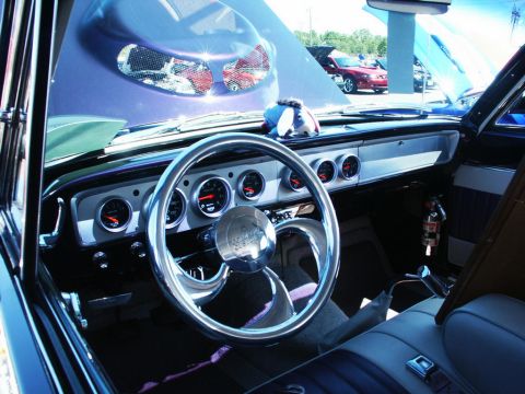 2001 Mercury Grand Marquis - Custom interior details of a car at a show, with a glimpse of another vehicle outside.