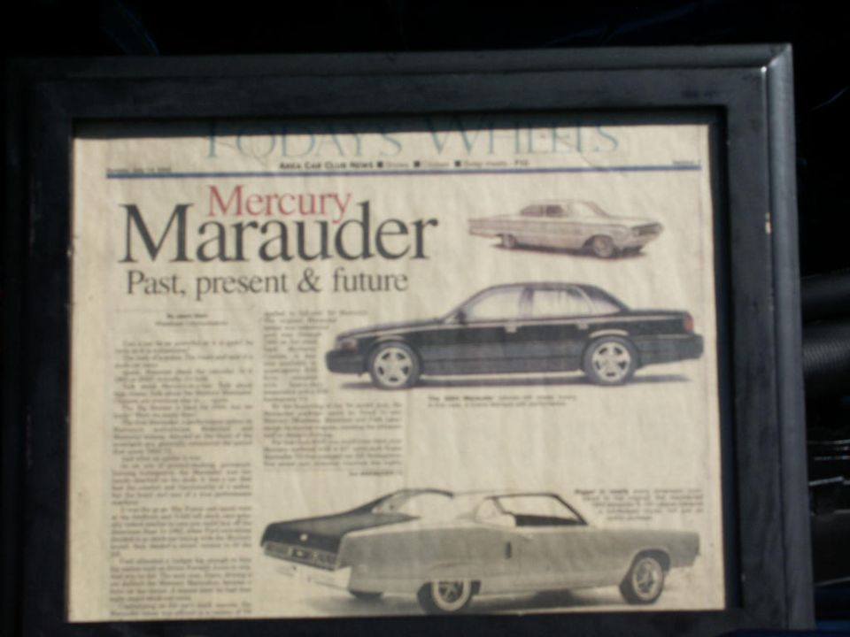 Framed newspaper article on the Mercury Marauder