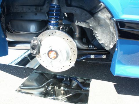 2001 Mercury Grand Marquis - This image focuses on the custom suspension and braking components of a vehicle, with a Supermotors.net watermark visible.