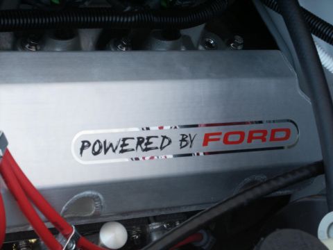 2001 Mercury Grand Marquis - This is a close-up view of an engine component, showing the "Powered by Ford" branding.